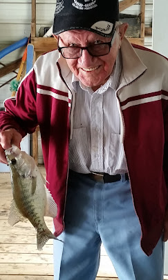 Proud guest holding a fish caught near Fort Gibson Lake
